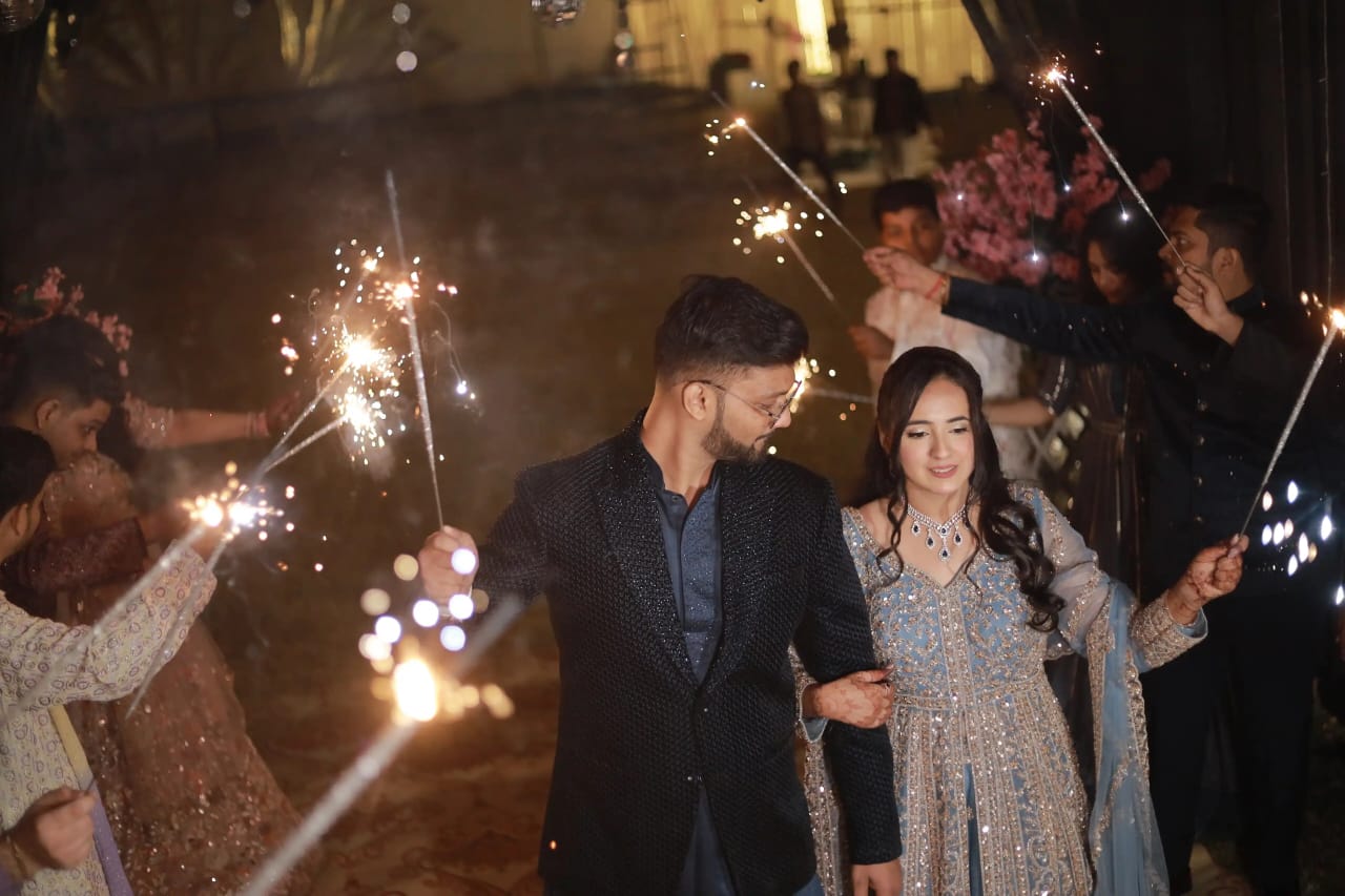 Indian bride and groom in traditional attire during the wedding ceremony celebration.